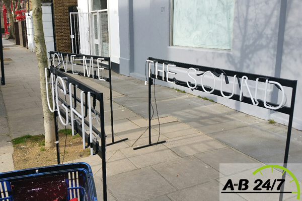 AB247 couriers delivered these extremely fragile neon signs for the album launch of The1975 band in Covent Garden, London