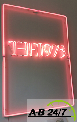 AB247 couriers delivered the bespoke neon signs for the album launch of The1975 band in Covent Garden, London