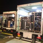 AB247 Event Truck unloading at night