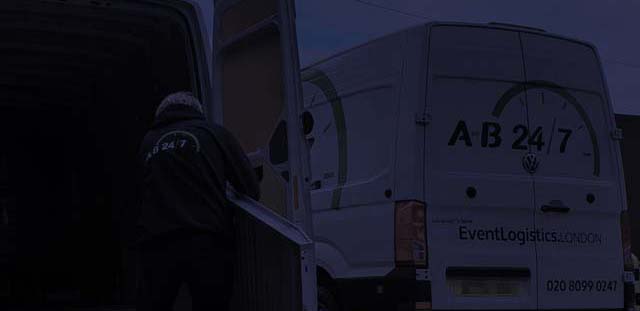 AB247 courier van being loaded at night
