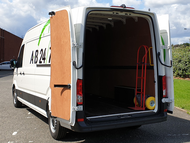 Photo showing rear of event van with doors open