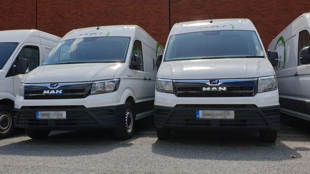 photo of a row of urgent delivery vans