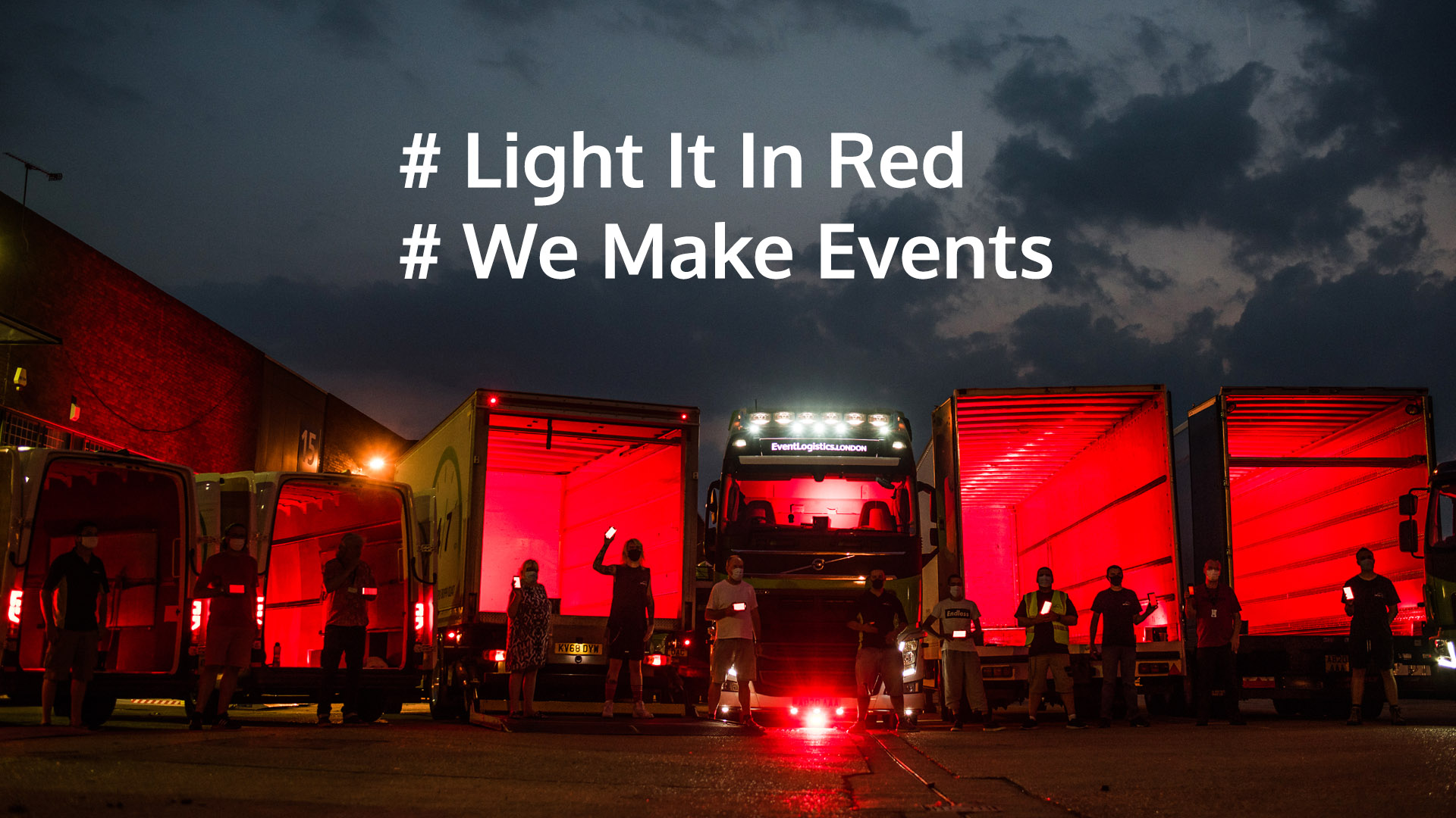 AB247 team in empty trucks for#lightitinred #wemakeevents